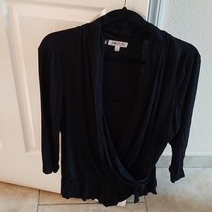 Never worn black blouse draped with cami inside